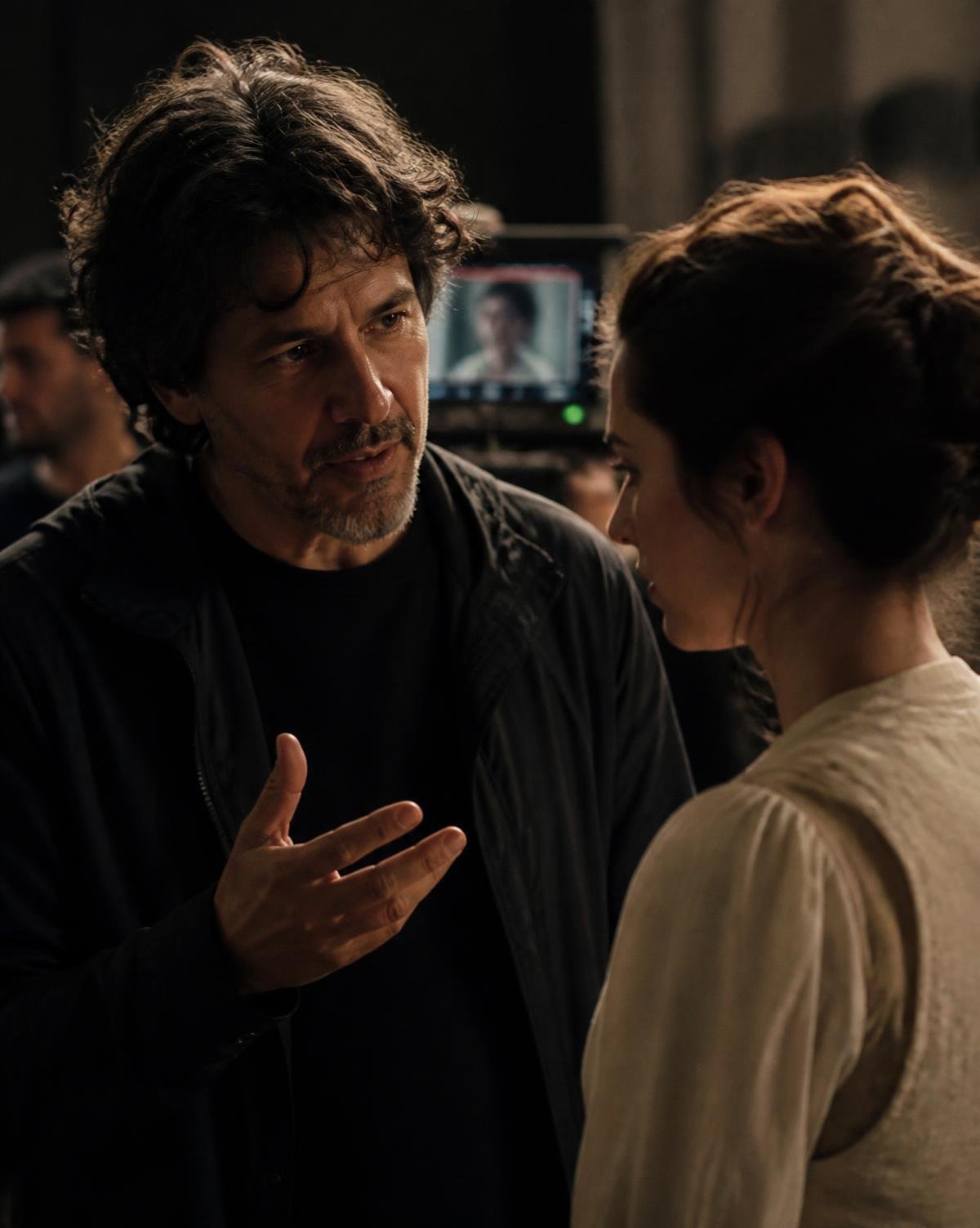 Director working with an actor on set